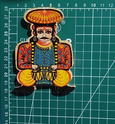 Man with dholak Wooden Miniature